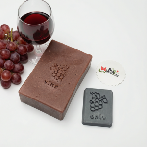 Sello "VINO" y racimo de uvas